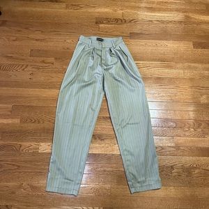Sage green pinstripe cigarette trousers